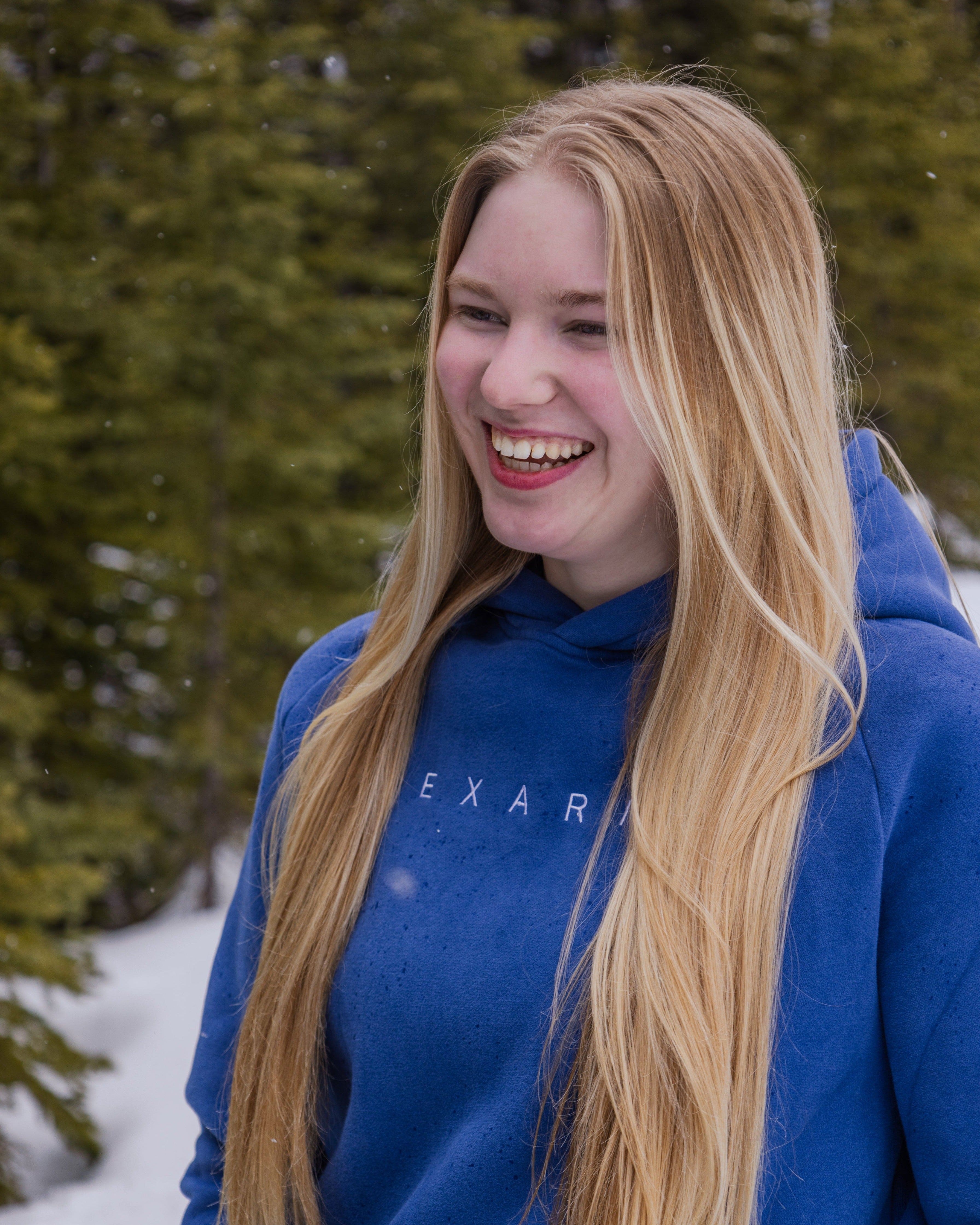 Front view of Nexarina Dusty Blue Hoodie showing soft cotton texture.
