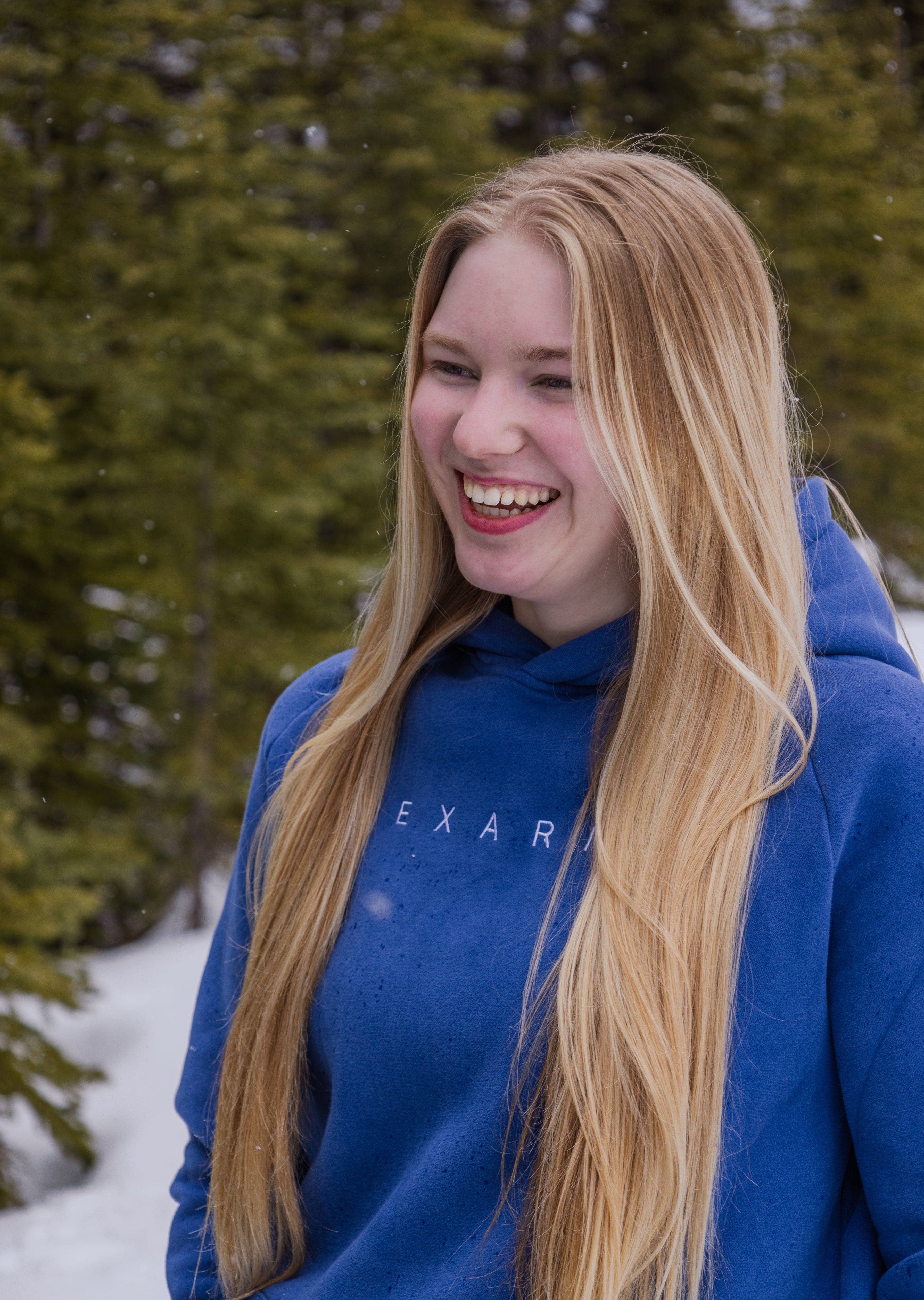 Front view of Nexarina Dusty Blue Hoodie showing soft cotton texture.