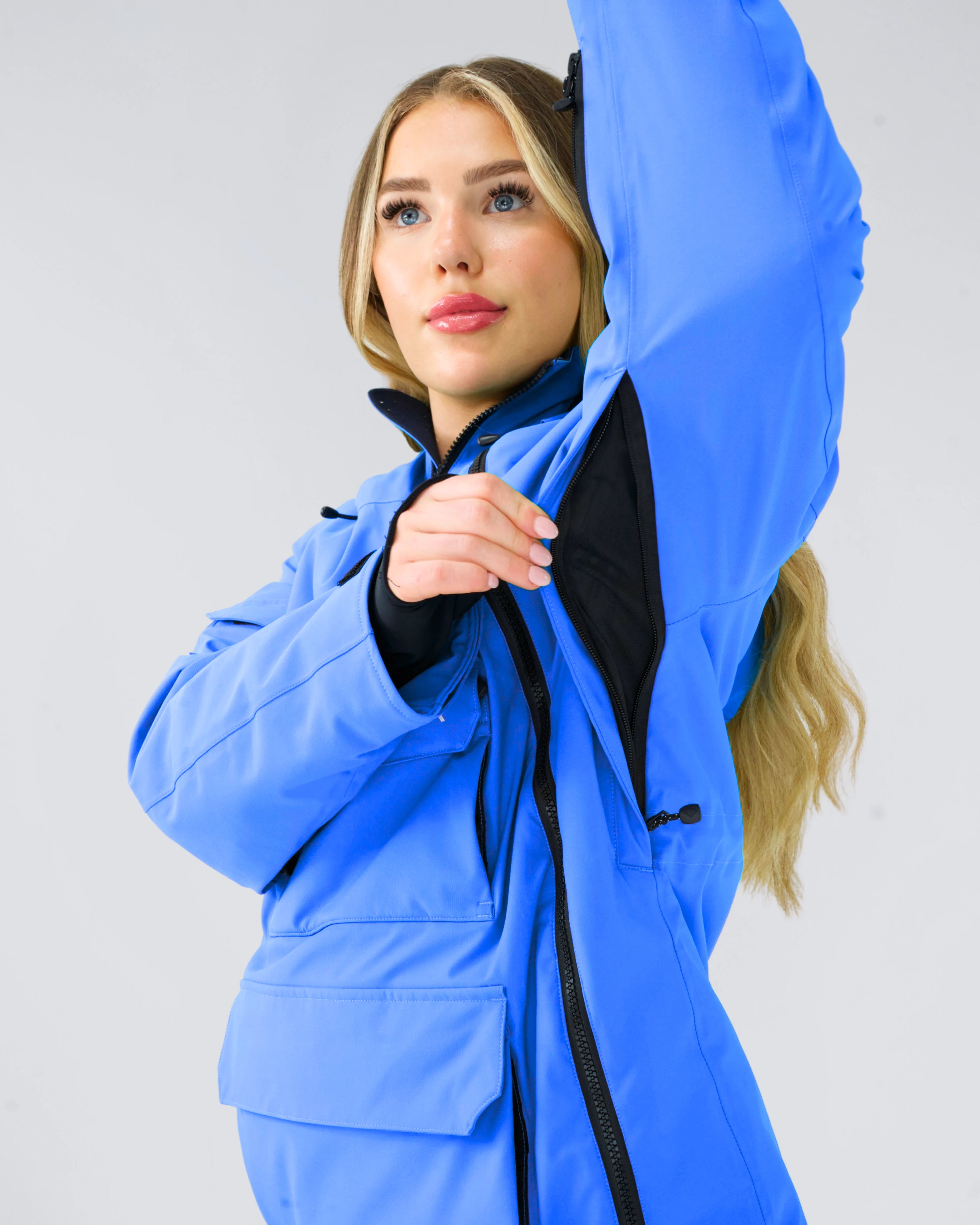 Close-up of Nexarina Indy Jacket in Arctic Blue showing vent and fabric detail.