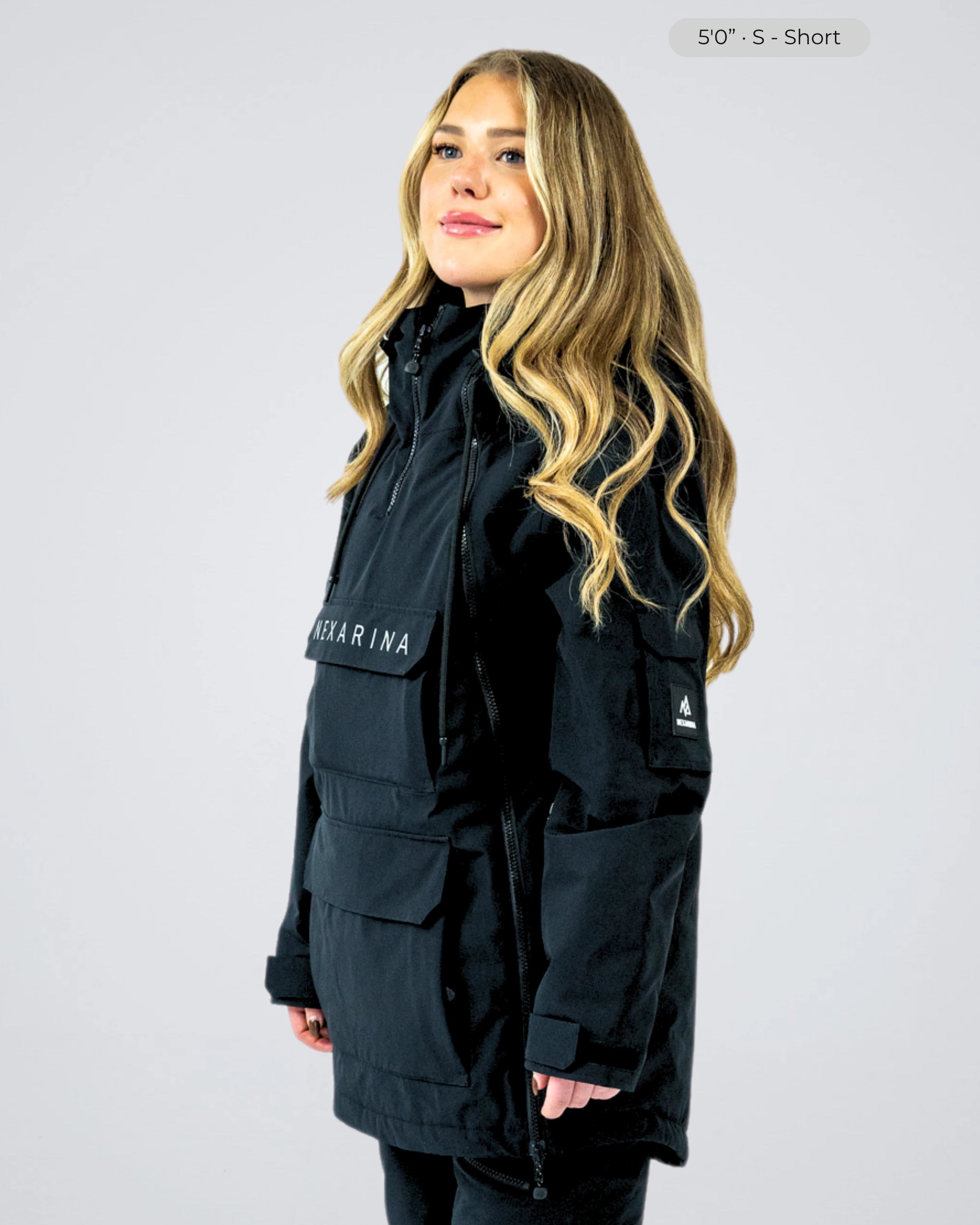 Nexarina Indy women's black snowboard jacket side profile studio