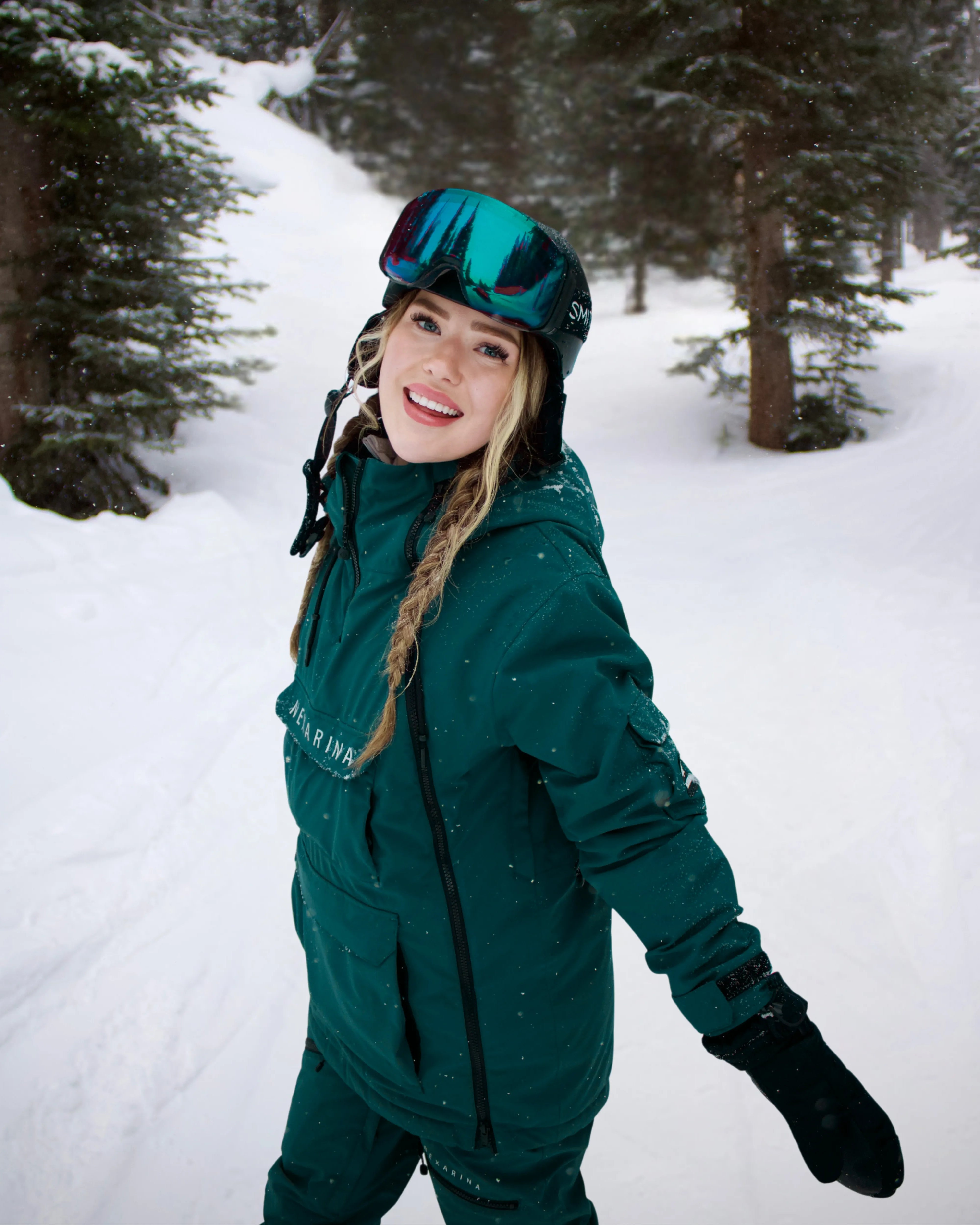 Woman in Nexarina Indy Jacket - Emerald Green short fit women’s outerwear.