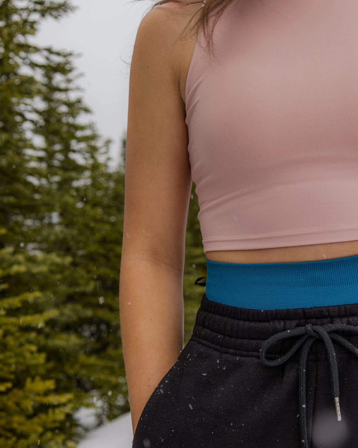 Close-up of the waistband and drawcord on Nexarina Willow Sweatpants in Midnight Black
