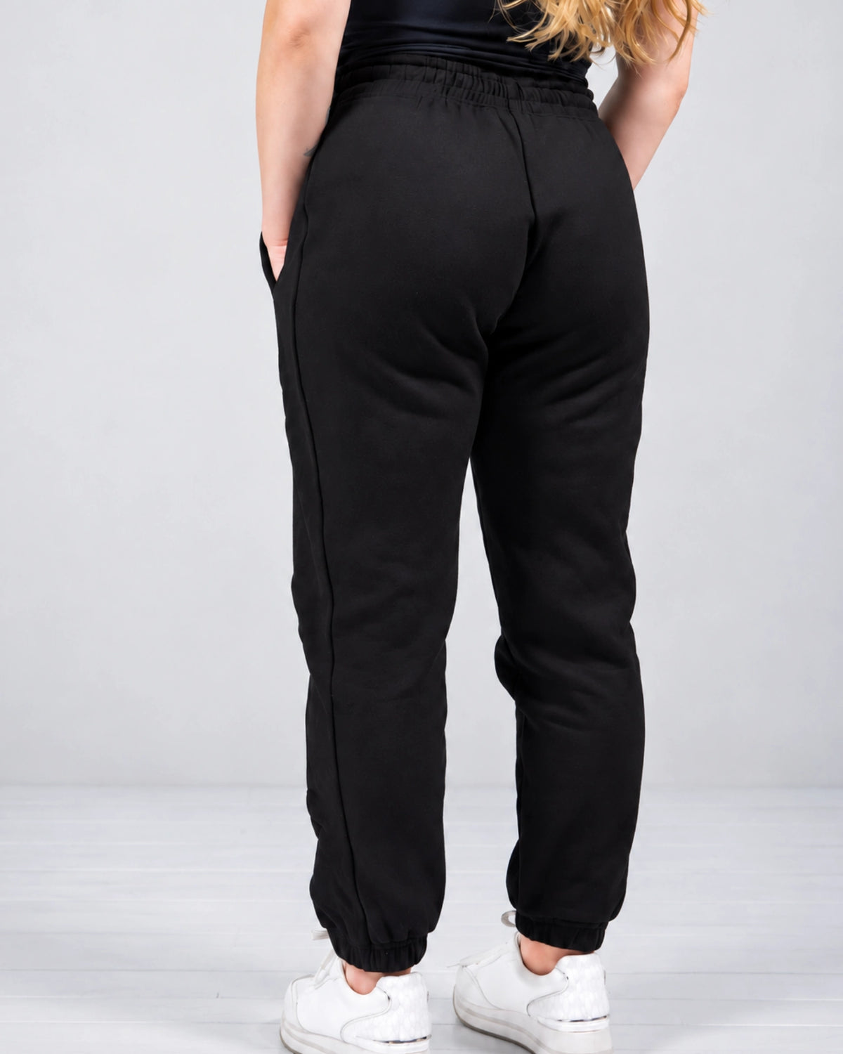 Back view of Nexarina Willow Sweatpants in Midnight Black