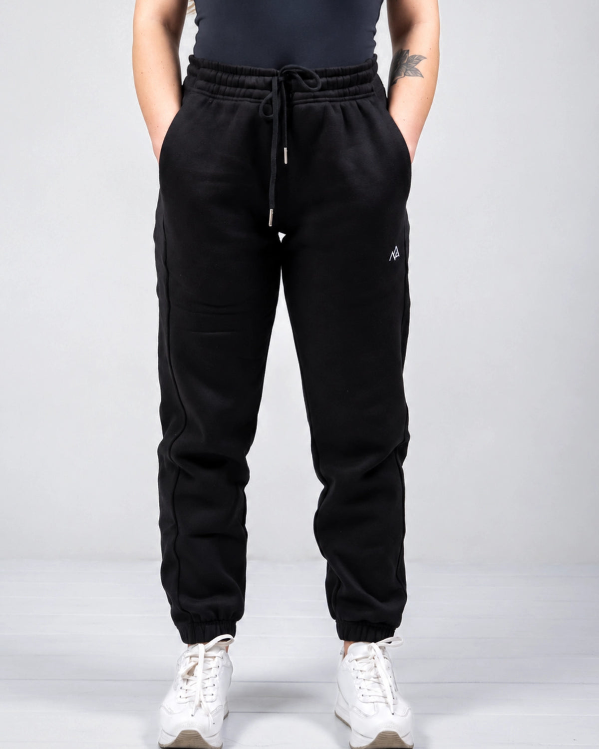 Front view of Nexarina Willow Sweatpants in Midnight Black