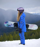 Side view of Arctic Blue women's snow bib with waterproof, breathable fabric and functional design.