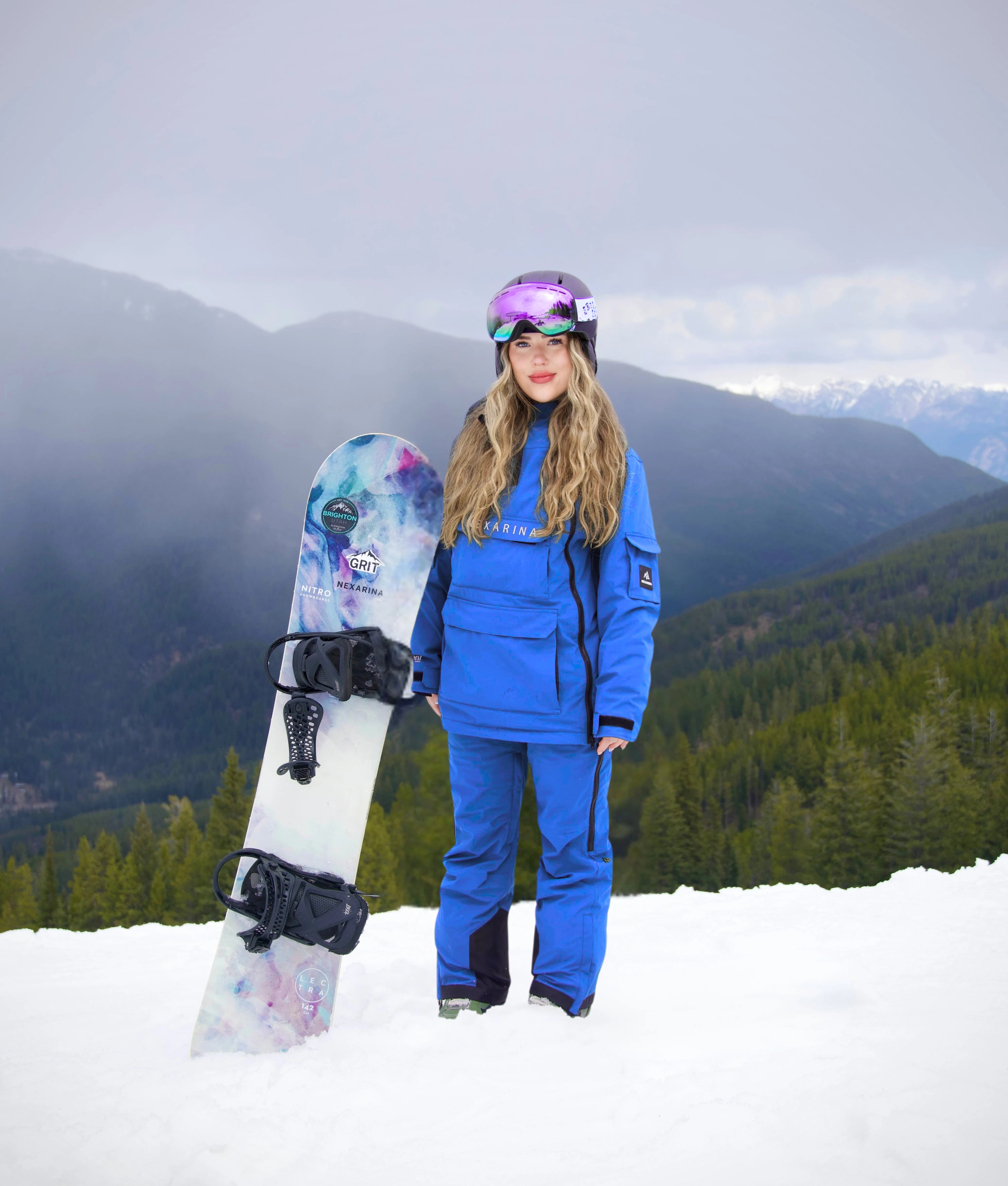 Nexarina Everette bib pants in Arctic Blue, designed for women snowboarders and skiers.