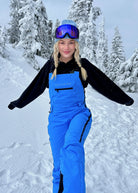 Nexarina Everette women's arctic blue snowboard bib front lifestyle view