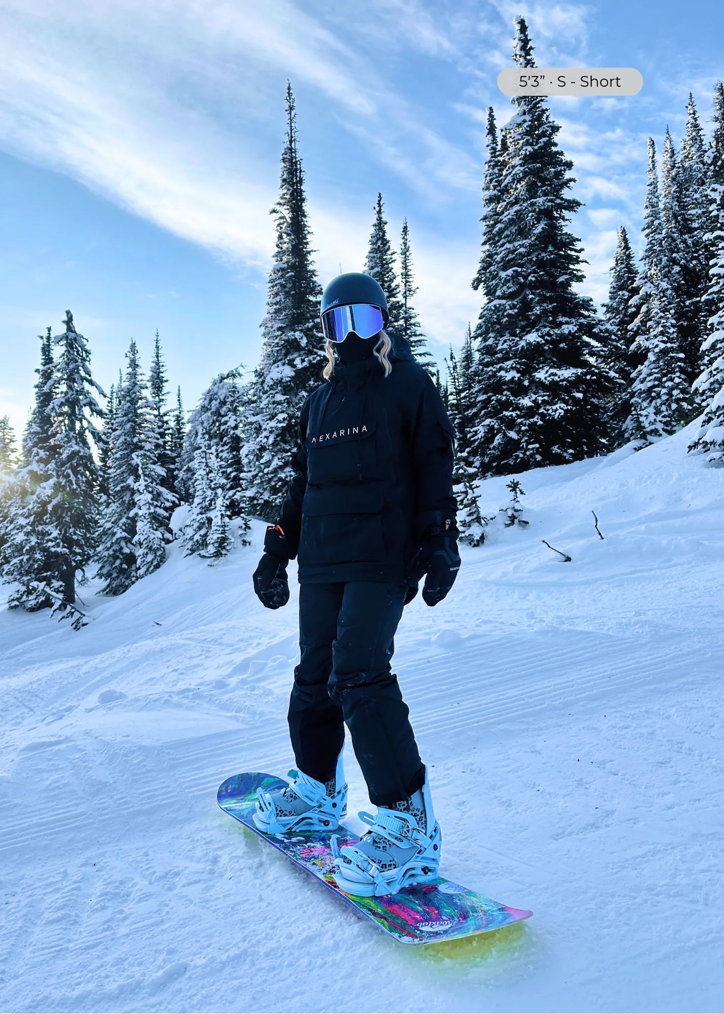 Nexarina Everette women's black snowboard bib riding snowboard action