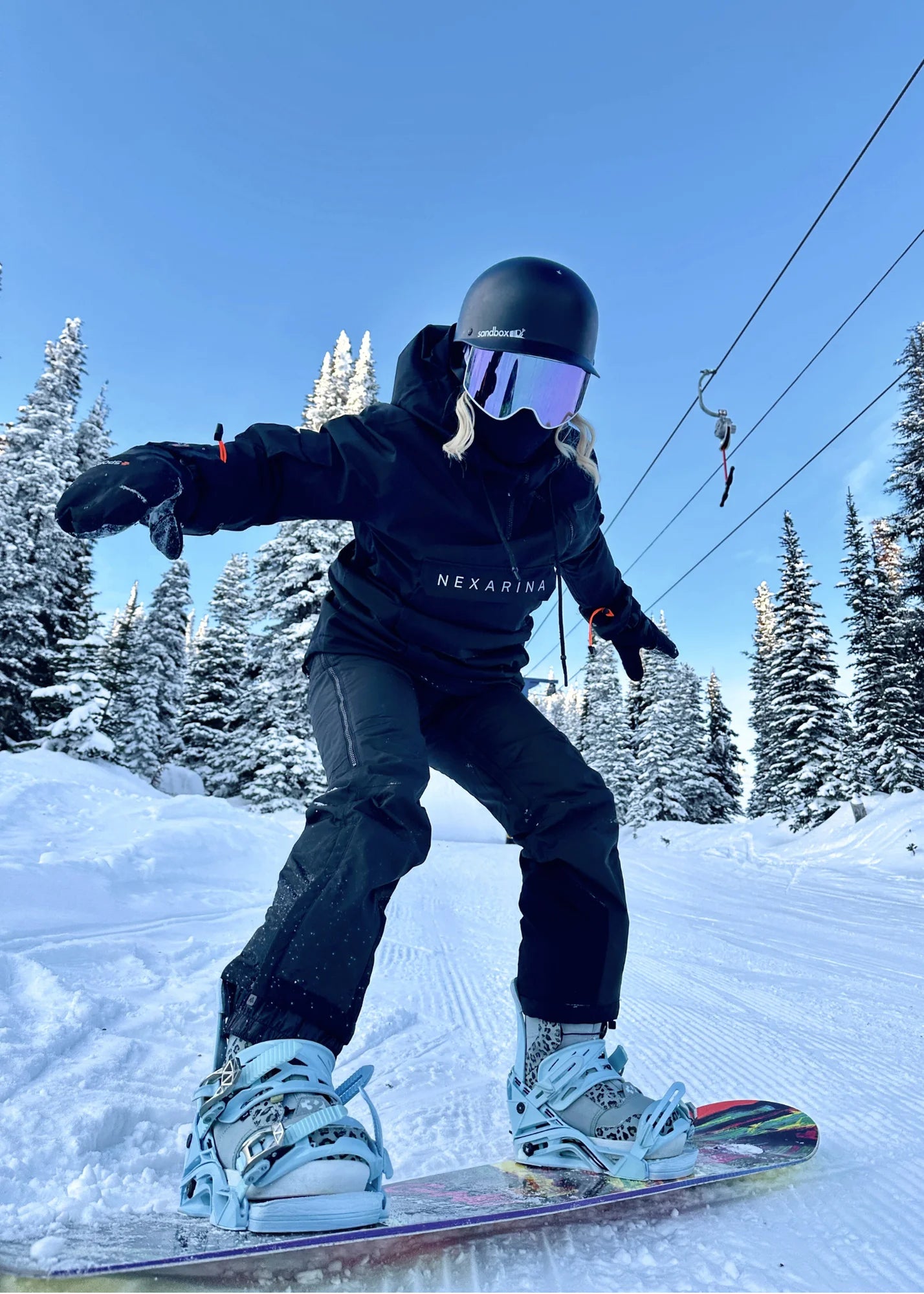 Nexarina Everette women's black snowboard bib lifestyle snow mountain shot