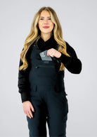 Nexarina Everette women's black snowboard bib pants chest pocket detail