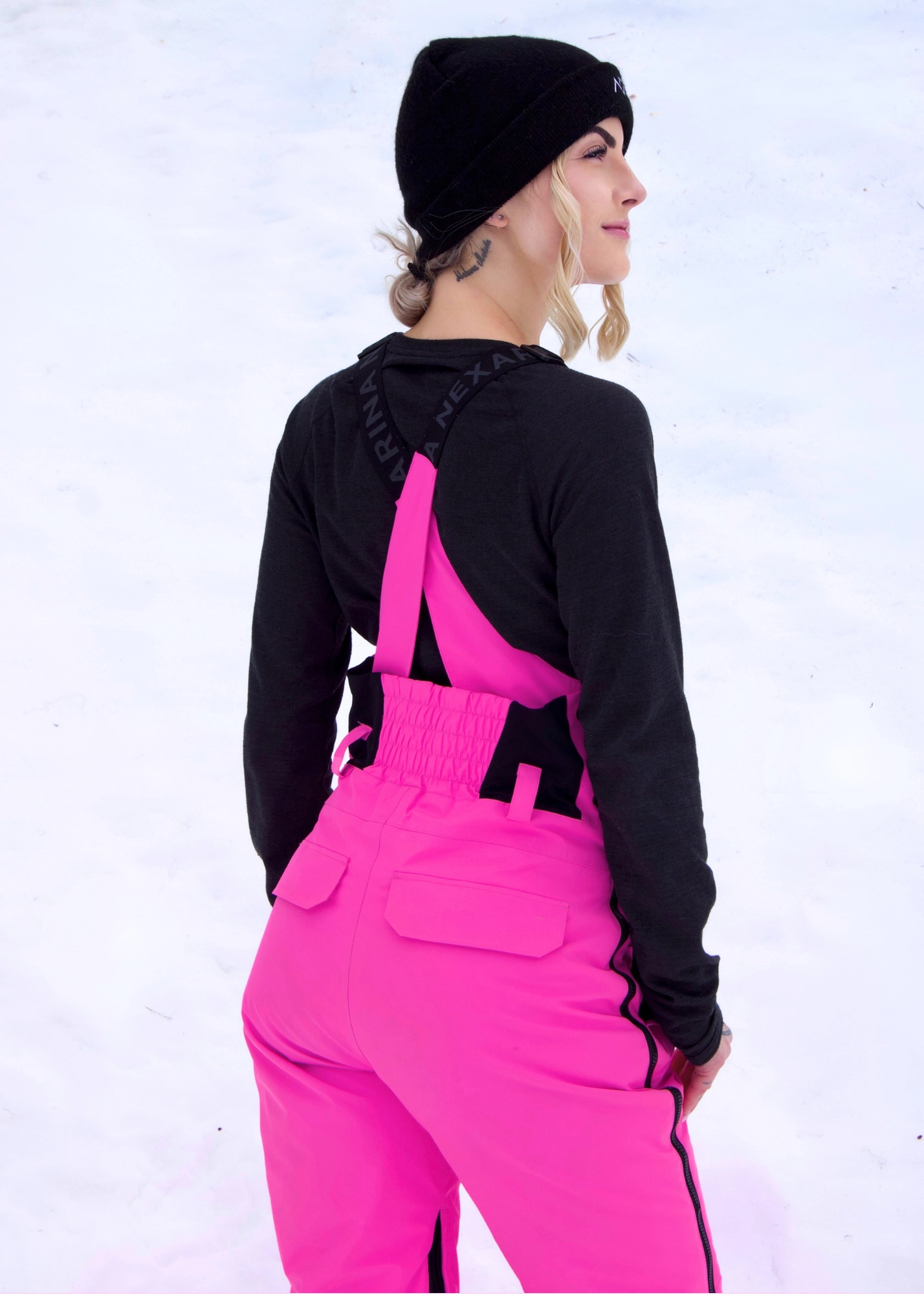 Women’s Nexarina Everette Bib in Electric Pink angled back view