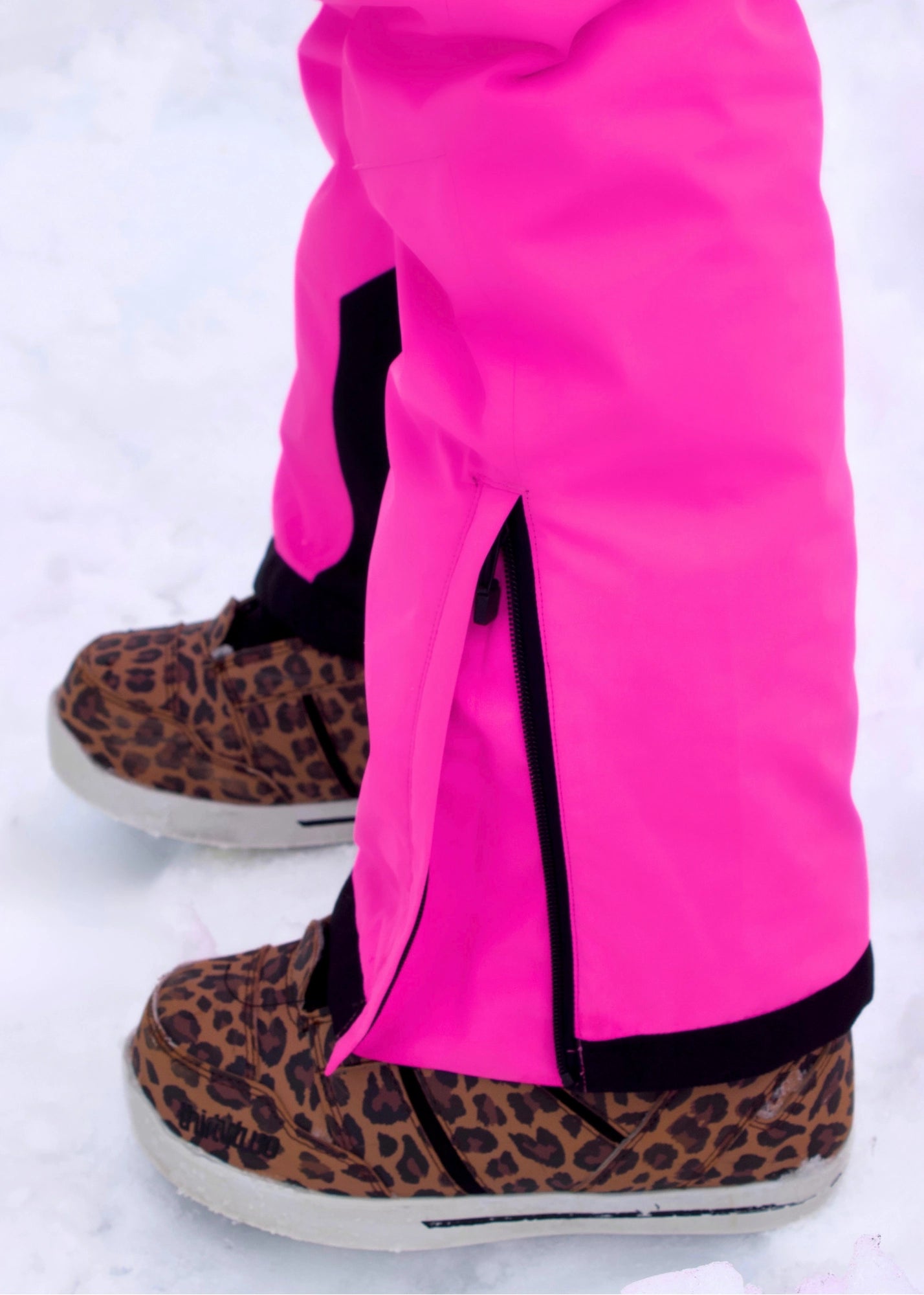 Women’s Nexarina Everette Bib in Electric Pink side zip hem detail