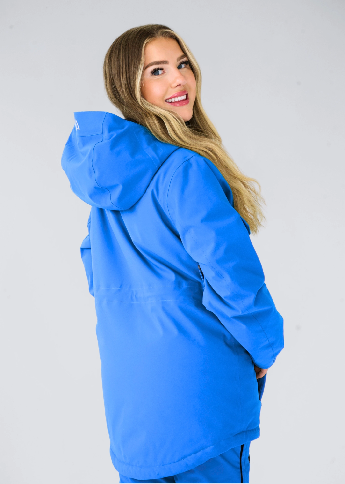 Nexarina Indy women's arctic blue snowboard jacket back studio view