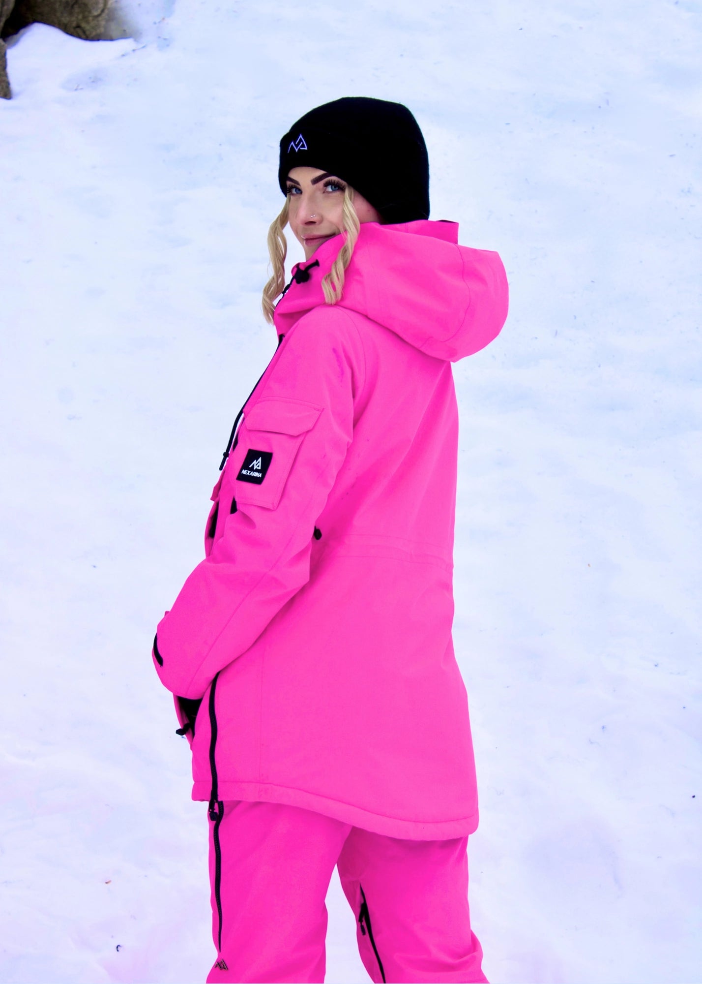 Women’s Nexarina Indy Snow Jacket in Electric Pink angled side view