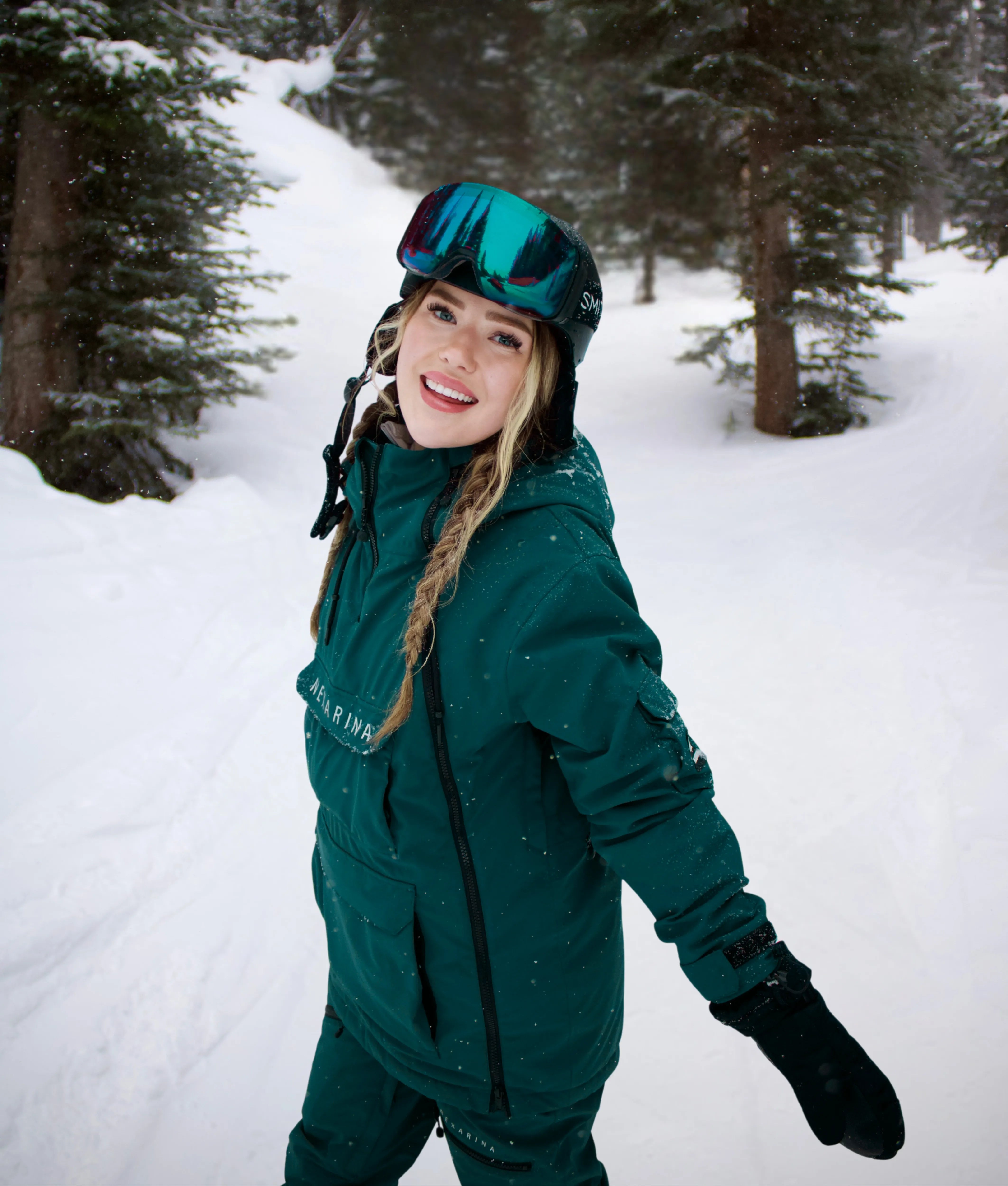 Woman in Nexarina Indy Jacket - Emerald Green short fit women’s outerwear.