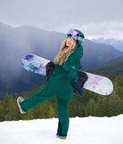 Female snowboarder in Nexarina Avani Emerald Green Snow Pant