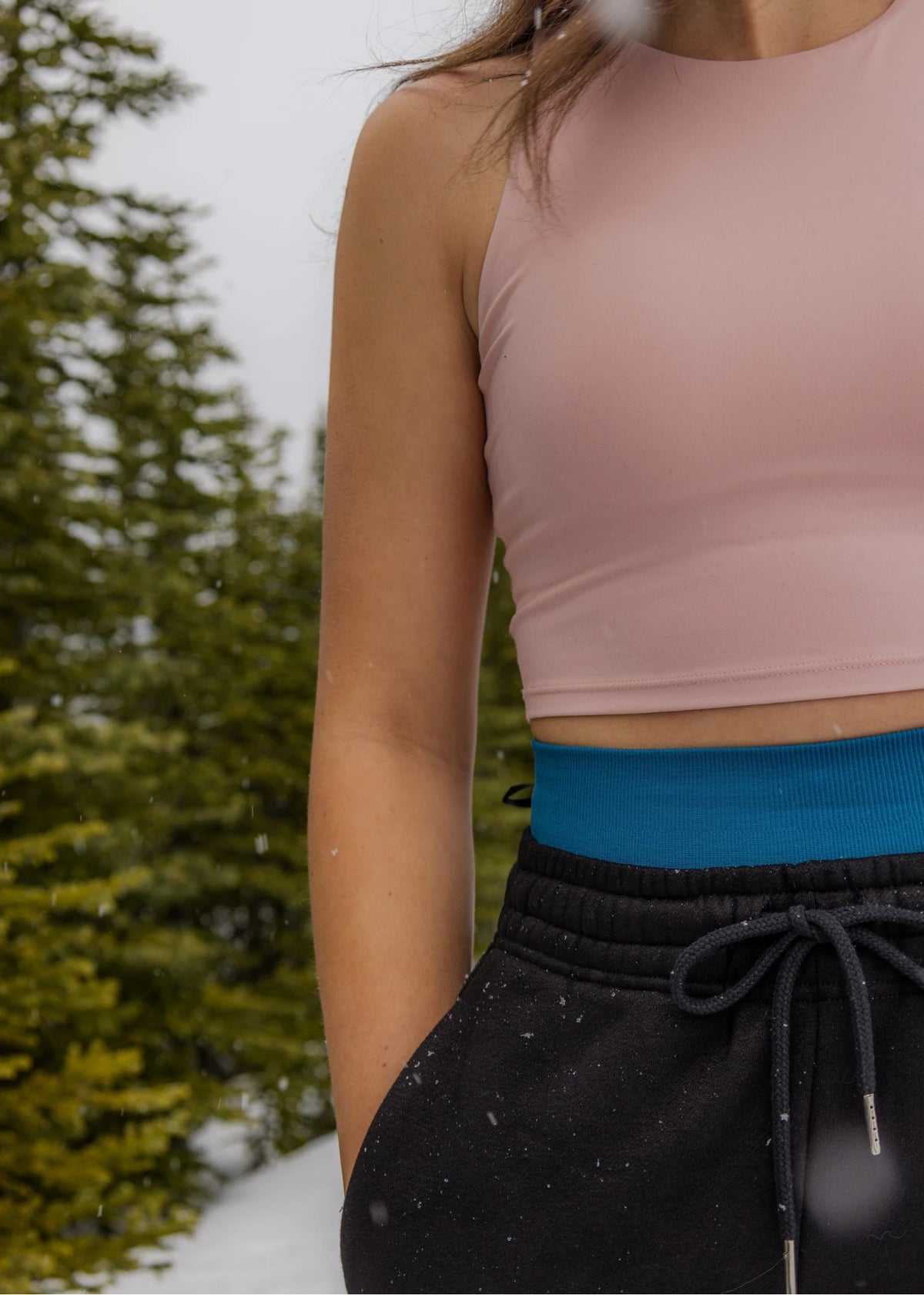 Close-up of the waistband and drawcord on Nexarina Willow Sweatpants in Midnight Black