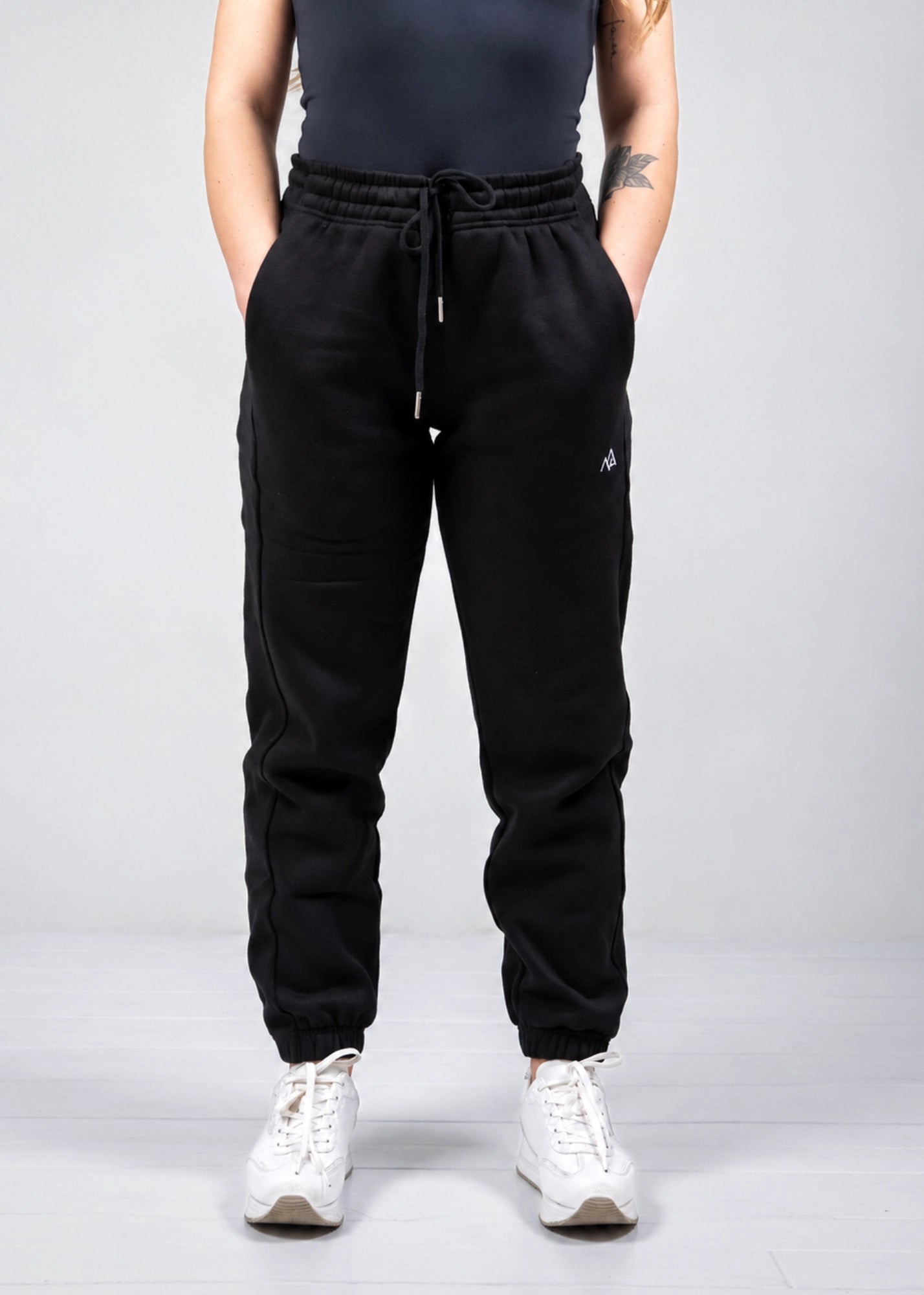 Front view of Nexarina Willow Sweatpants in Midnight Black