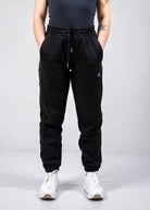Front view of Nexarina Willow Sweatpants in Midnight Black