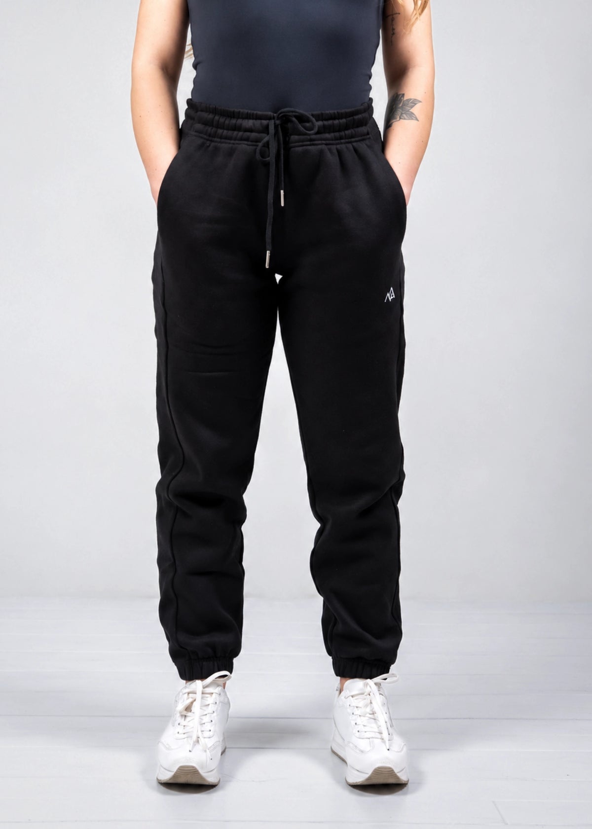 Front view of Nexarina Willow Sweatpants in Midnight Black